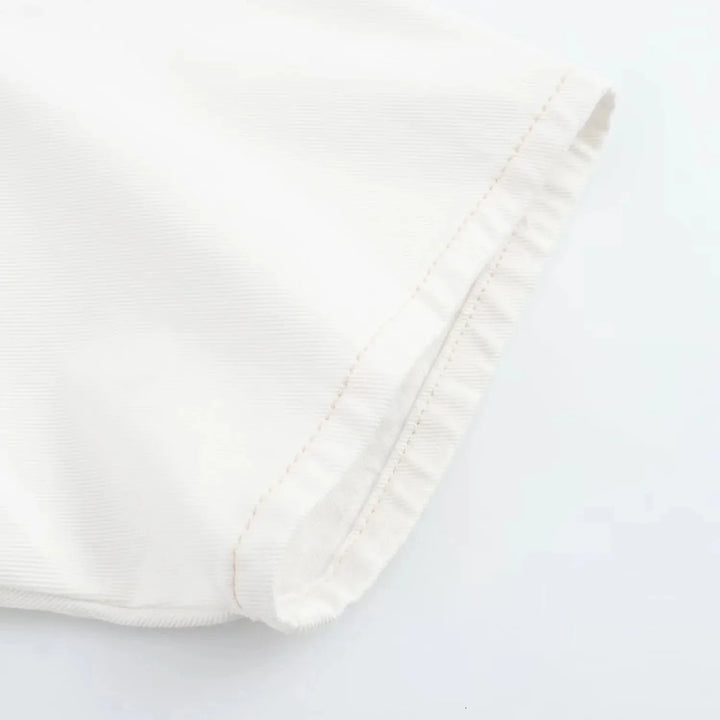 Two-Piece White Denim Set with Mini Skirt Pants and Buttoned Polo Collar Blazer - Genesis