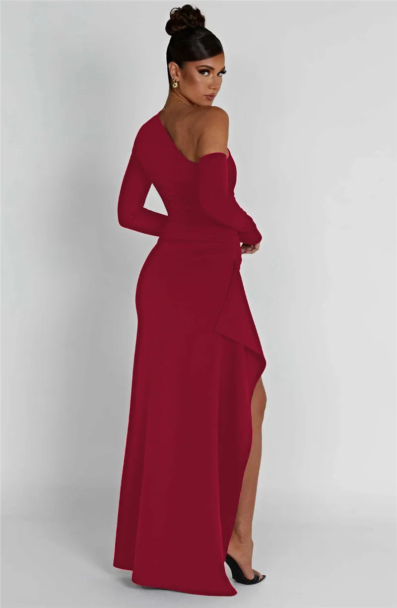 Ruffled maxi dress with shoulder slit and off-shoulder design - Melania