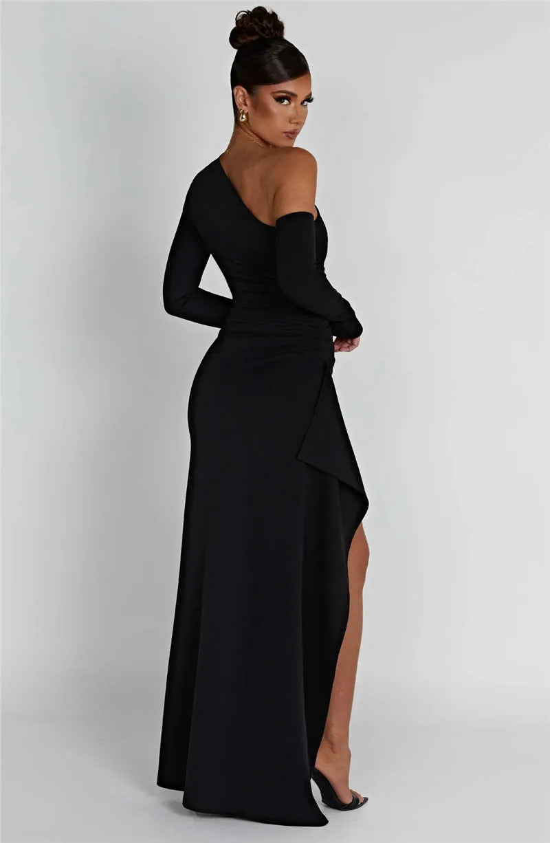 Ruffled maxi dress with shoulder slit and off-shoulder design - Melania