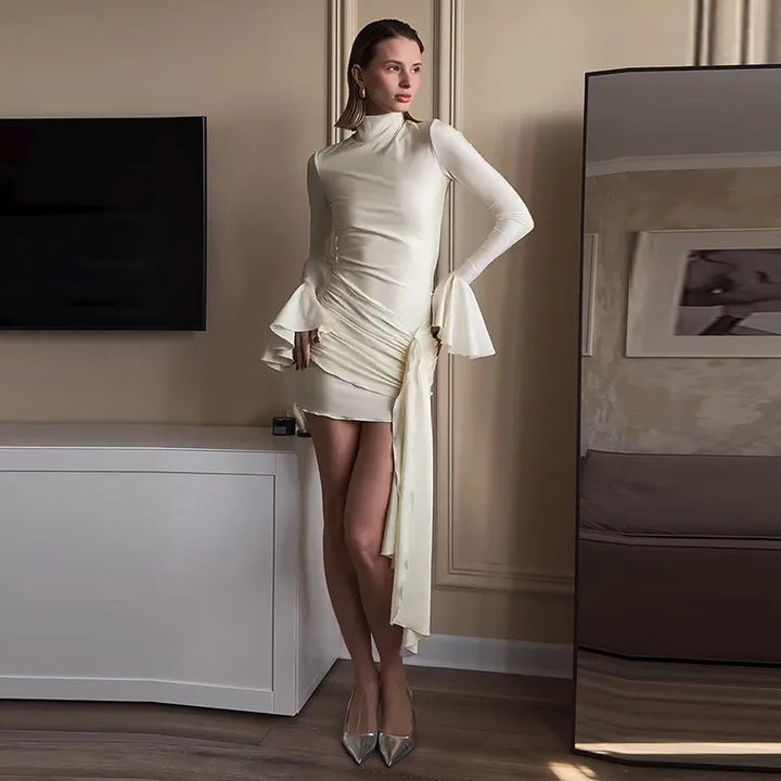 Turtleneck mini dress with bell sleeves and ruffle detail - Jenna