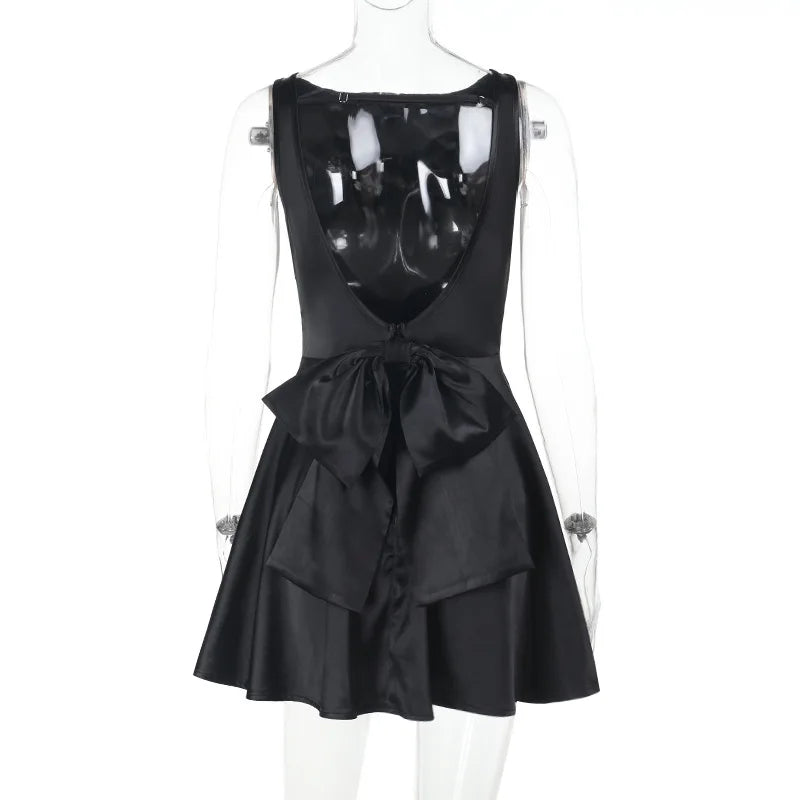 Silk satin mini dress in A-line cut with open back and bow detail - ELLIE