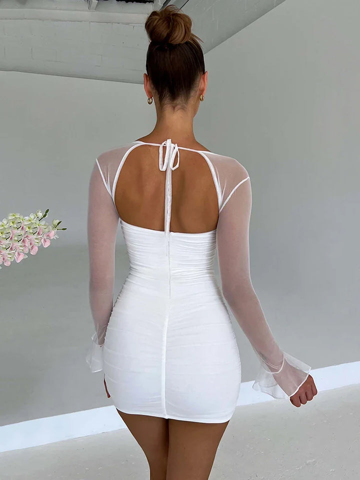 Ruched mini dress with open back and mesh sleeves - Ariana