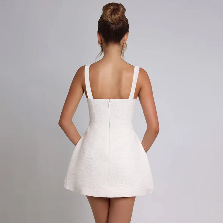 Woven mini dress in A-line cut with pocket decoration - Mili