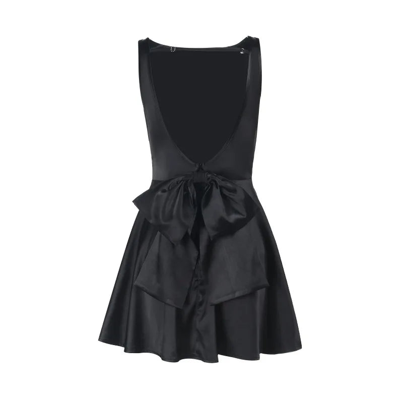 Silk satin mini dress in A-line cut with open back and bow detail - ELLIE