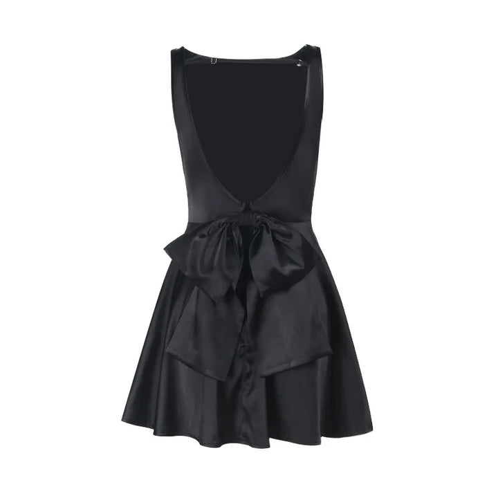 Silk satin mini dress in A-line cut with open back and bow detail - ELLIE