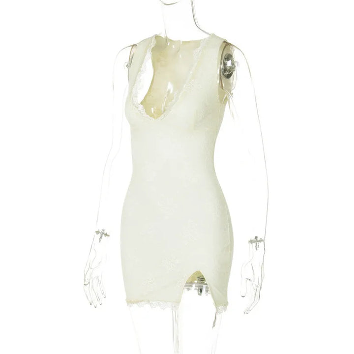 Fitted mini dress with lace, floral embroidery, and small slit - Neil