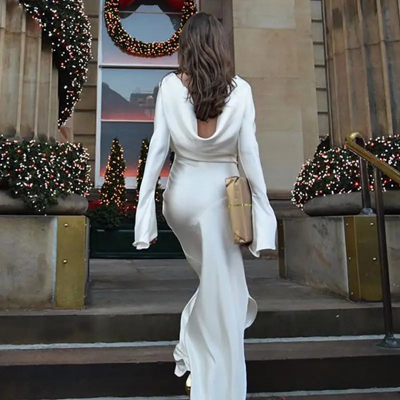 Maxi satin evening dress with open back, slit, and bell sleeves - Marian
