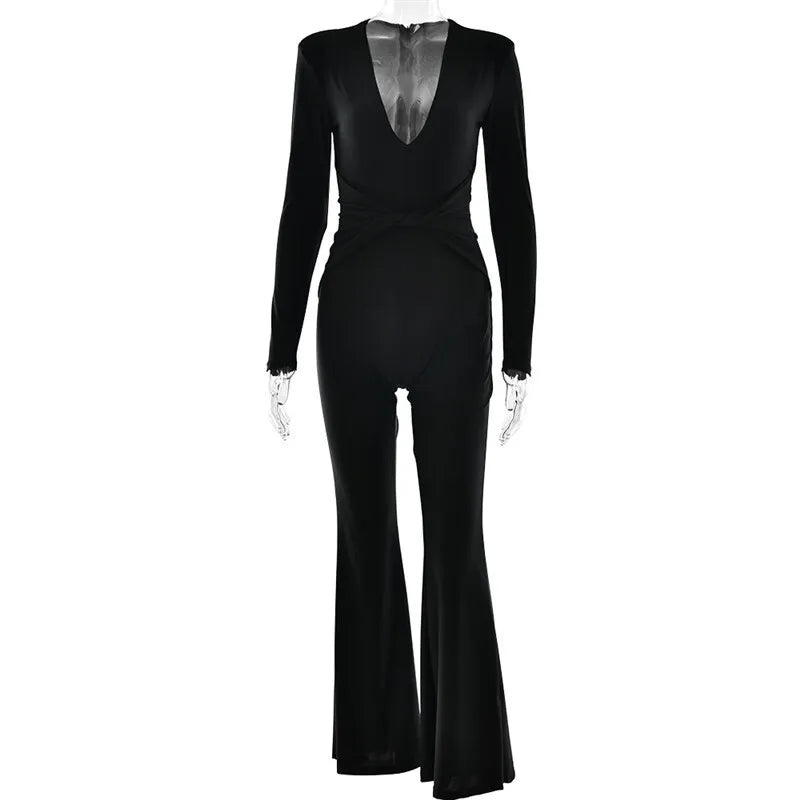Fitted long jumpsuit with shaping fabric, deep V neckline, and cross decoration - Laini