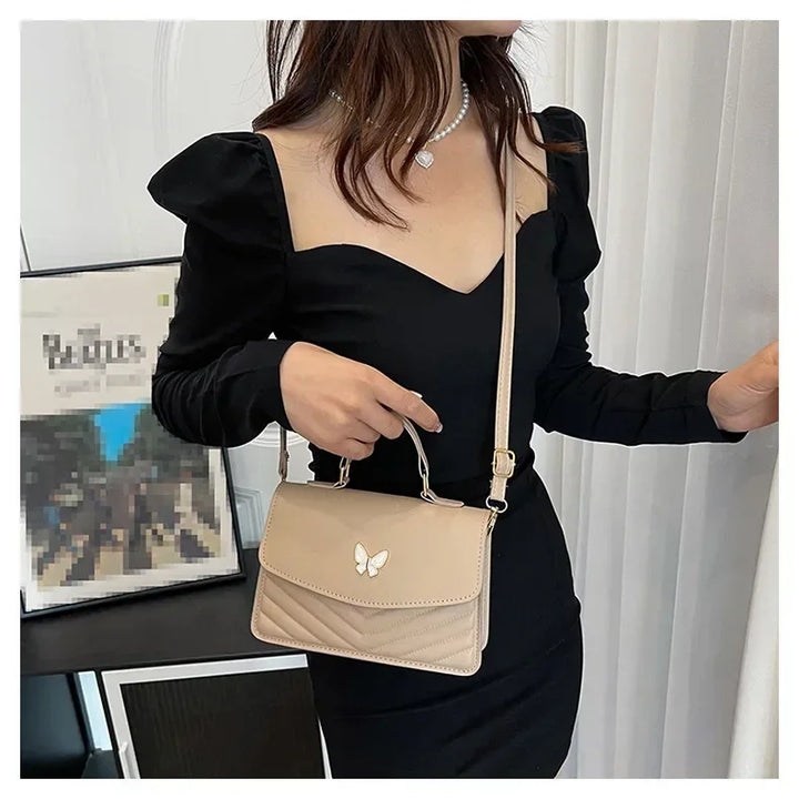 תיק דמוי עור בעיטור פרפר