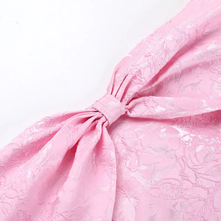 A-line mini dress with bow design and floral embroidery detail - Lenora