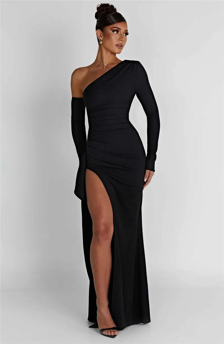 Ruffled maxi dress with shoulder slit and off-shoulder design - Melania
