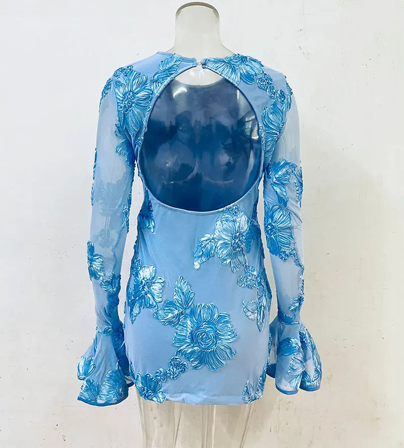 Mini dress decorated with floral embroidery and open back - Michaela