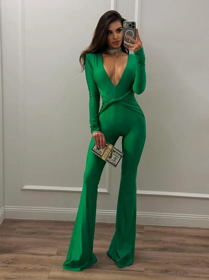 Fitted long jumpsuit with shaping fabric, deep V neckline, and cross decoration - Laini