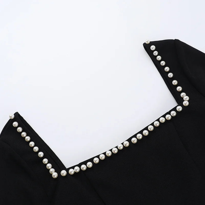 A-line mini dress decorated with pearls - Cory