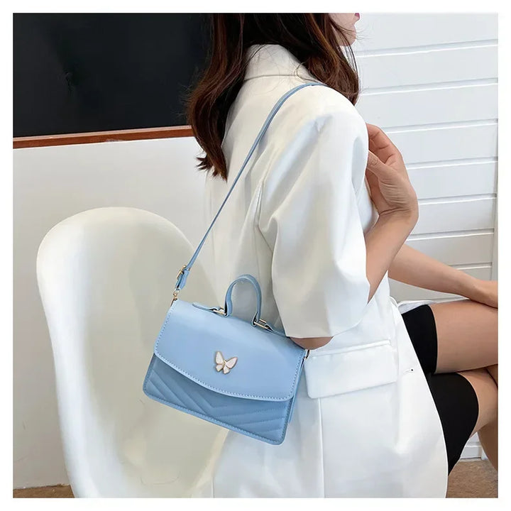 תיק דמוי עור בעיטור פרפר