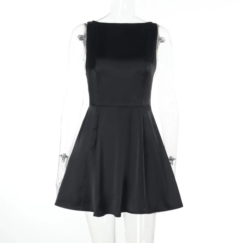 Silk satin mini dress in A-line cut with open back and bow detail - ELLIE