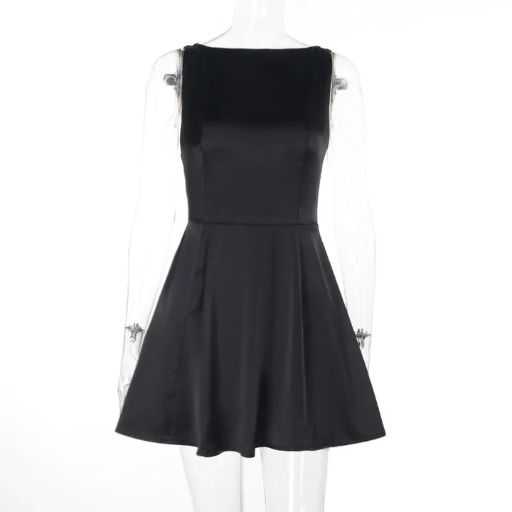 Silk satin mini dress in A-line cut with open back and bow detail - ELLIE