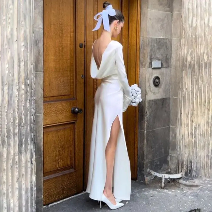 Maxi satin evening dress with open back, slit, and bell sleeves - Marian
