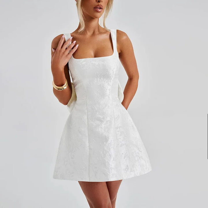 Mini dress with floral illustration print and bow detail on the back - Louisa