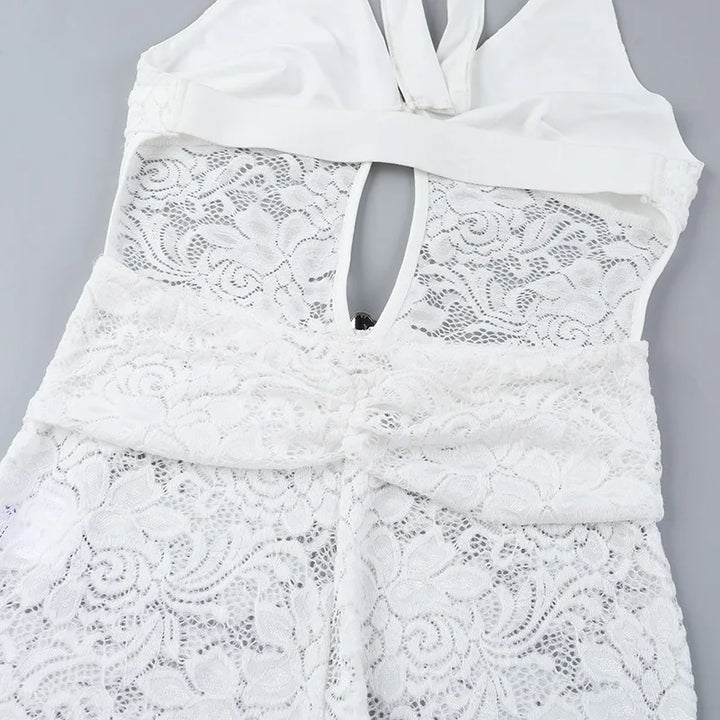 Long lace jumpsuit with open back and buckle details - Brighton