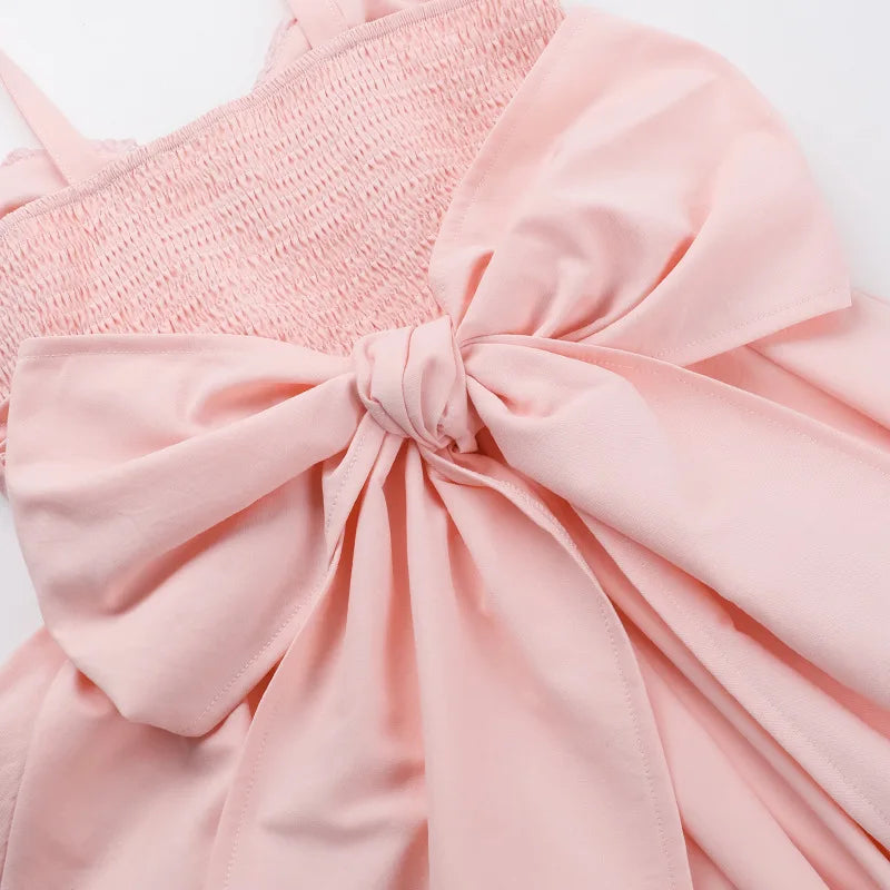 A-line mini dress with corset design and bow tie detail on the back - Kaiya