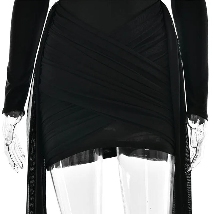 Mini turtleneck dress with chiffon ruched bottom, cross cut, and chiffon ruffle decoration - Marina
