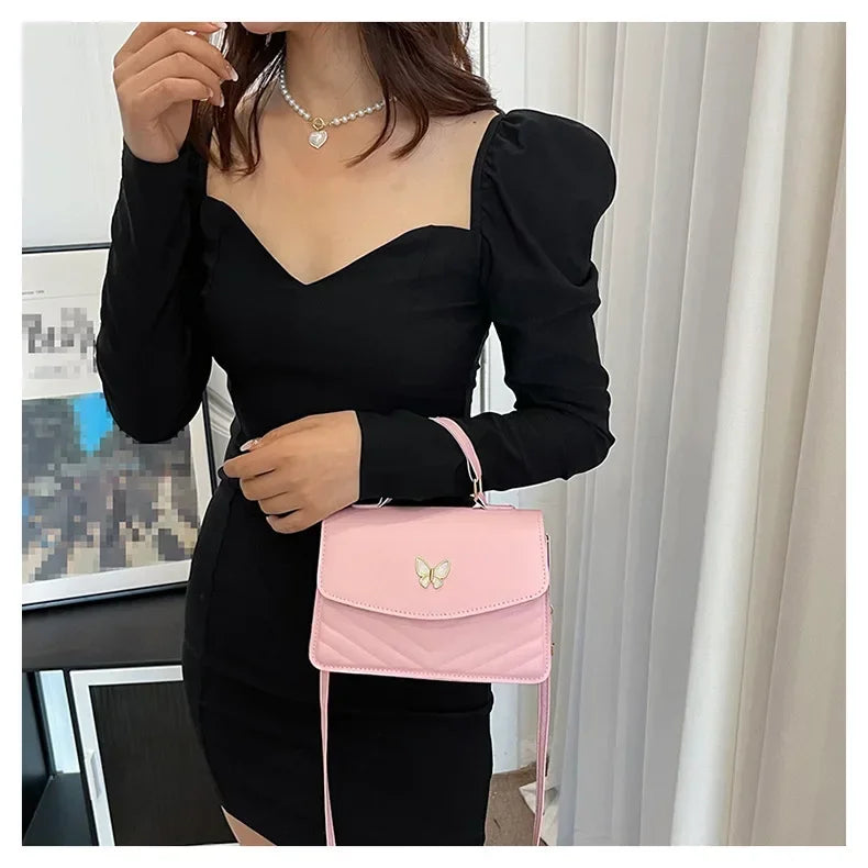 תיק דמוי עור בעיטור פרפר