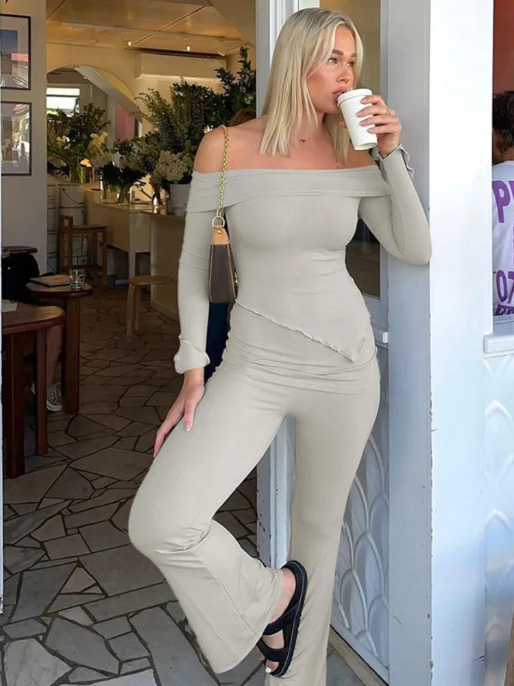 Two-piece knitted set with asymmetrical off-shoulder top and long pants - ROZIE