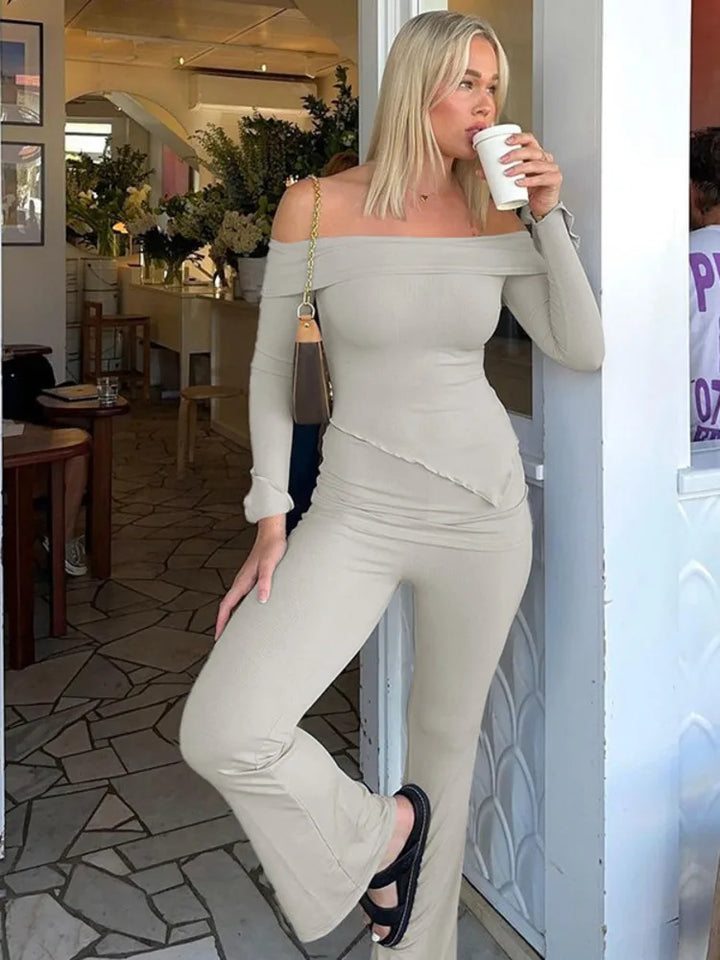 Two-piece knitted set with asymmetrical off-shoulder top and long pants - ROZIE