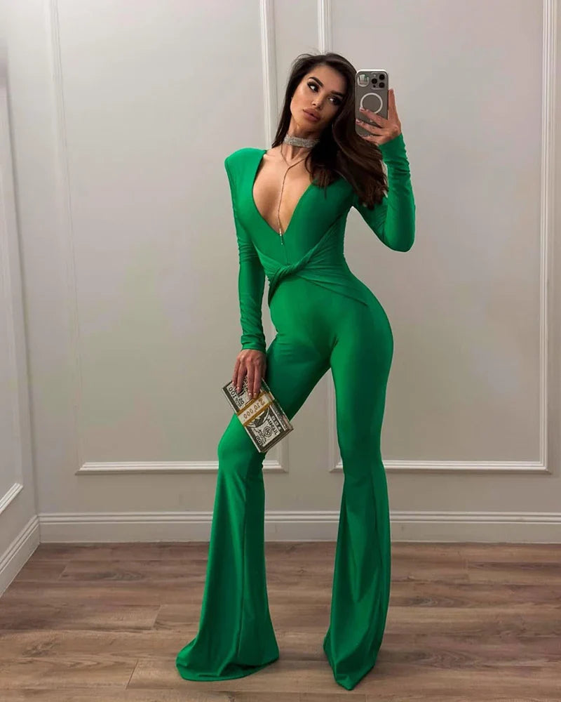 Fitted long jumpsuit with shaping fabric, deep V neckline, and cross decoration - Laini