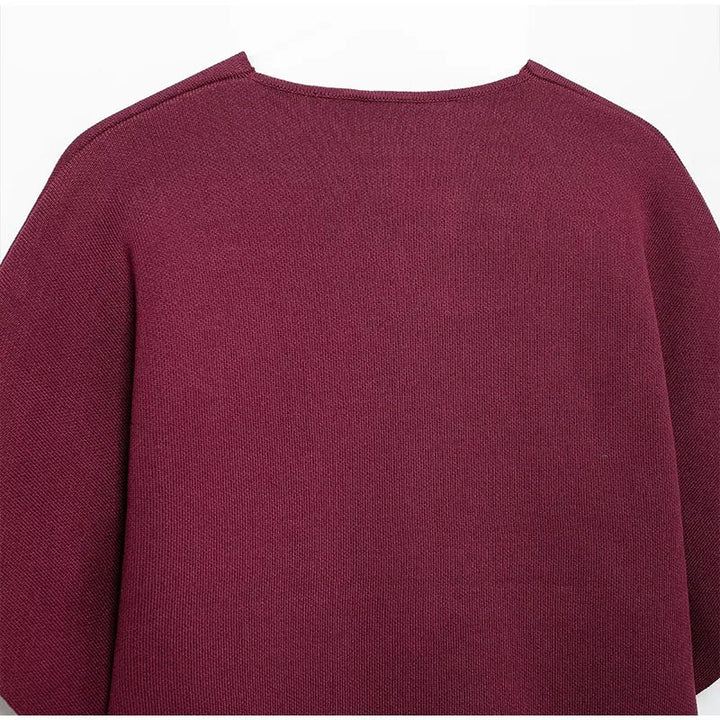 Elegant sweater with gold button decoration - Nela