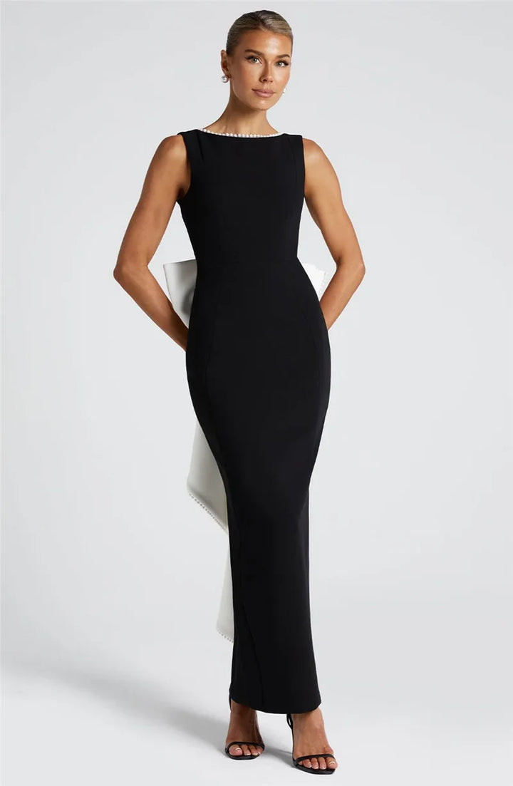 Elegant maxi dress with open back, bow, and pearl decoration - Alberta