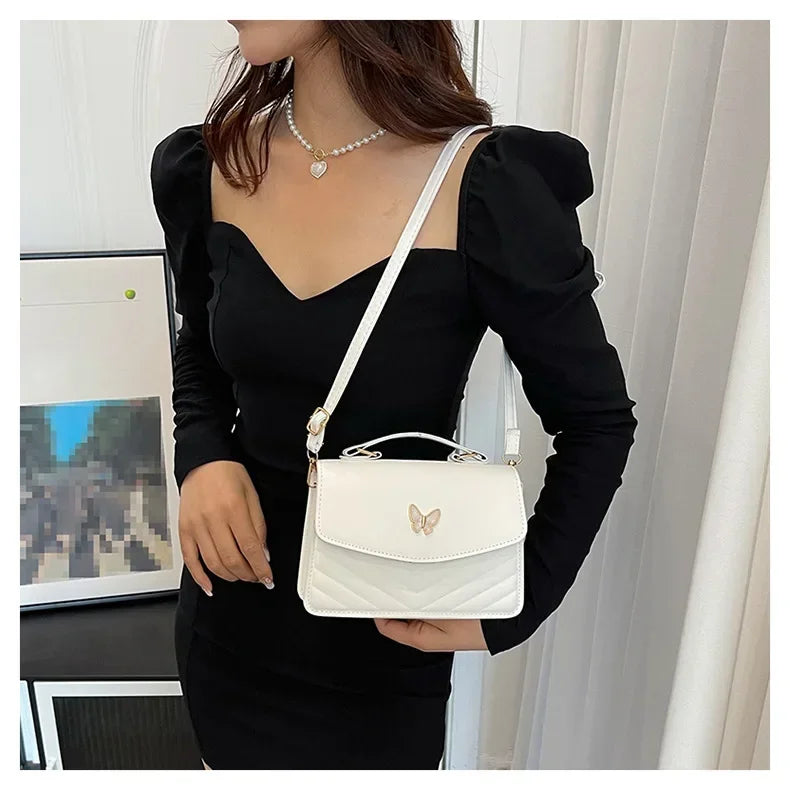 תיק דמוי עור בעיטור פרפר