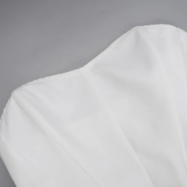 Strapless mini dress with bow detail on the back and added tulle underskirt - Novalee