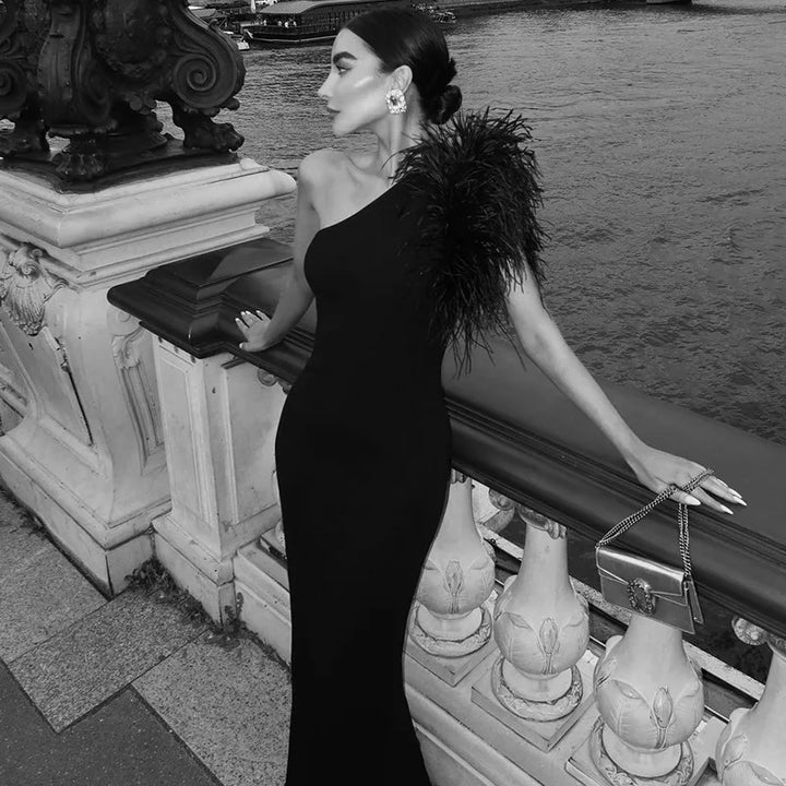 Elegant one-shoulder maxi evening dress decorated with feathers - Talia