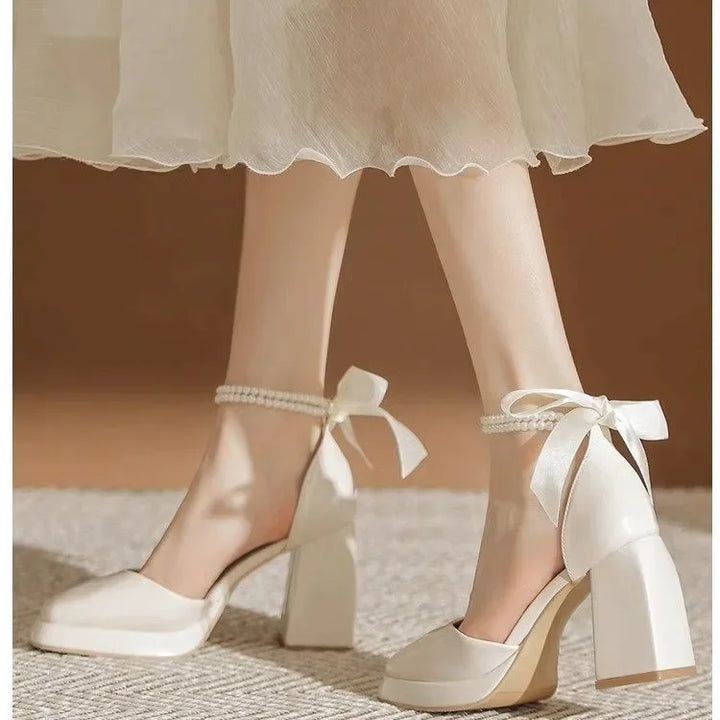 Shiny Faux Leather High Heels with Pearl and Bow Decoration - Vivian