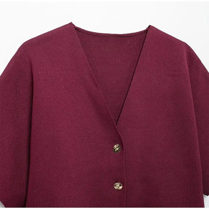 Elegant sweater with gold button decoration - Nela