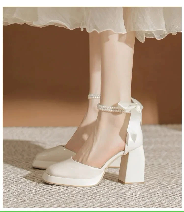 Shiny Faux Leather High Heels with Pearl and Bow Decoration - Vivian