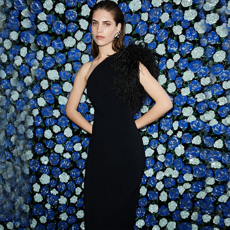 Elegant one-shoulder maxi evening dress decorated with feathers - Talia