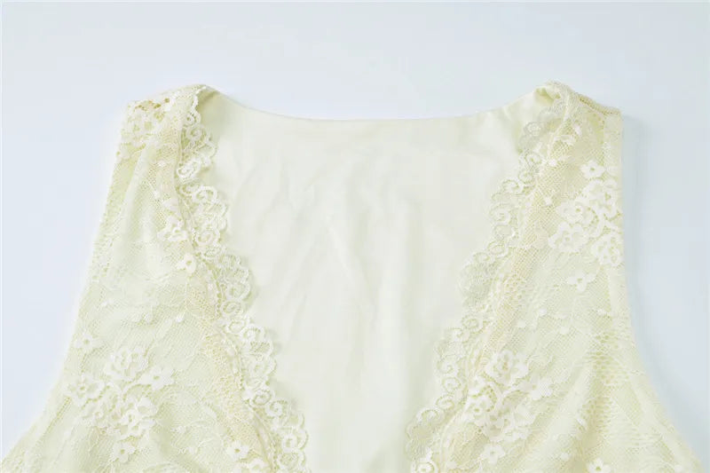 Fitted mini dress with lace, floral embroidery, and small slit - Neil
