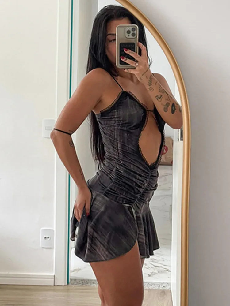 Ruffled mini dress with open back design - Tate