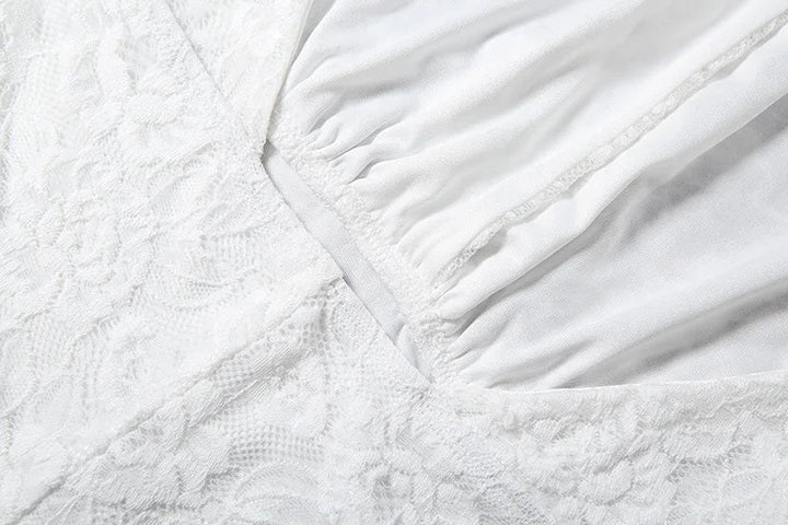Short lace jumpsuit with a neck tie and open back - Lis