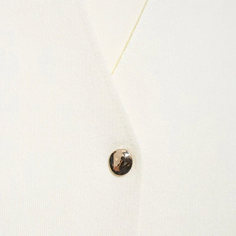 Elegant sweater with gold button decoration - Nela