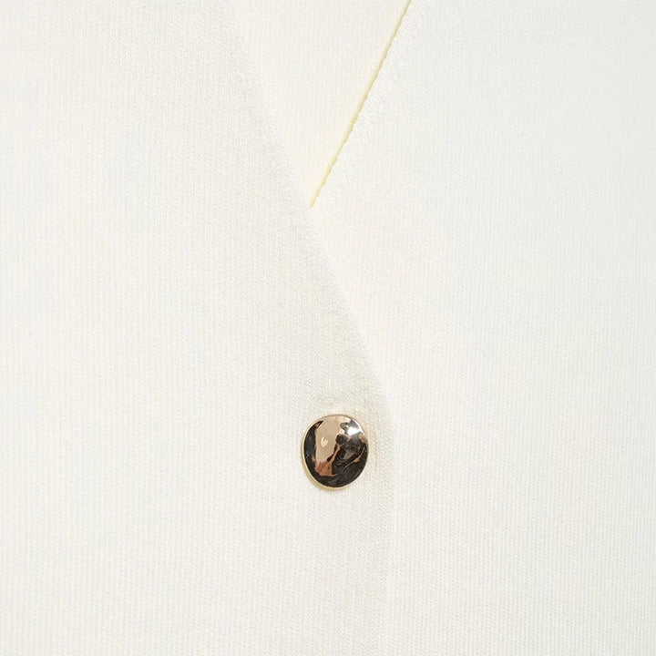 Elegant sweater with gold button decoration - Nela