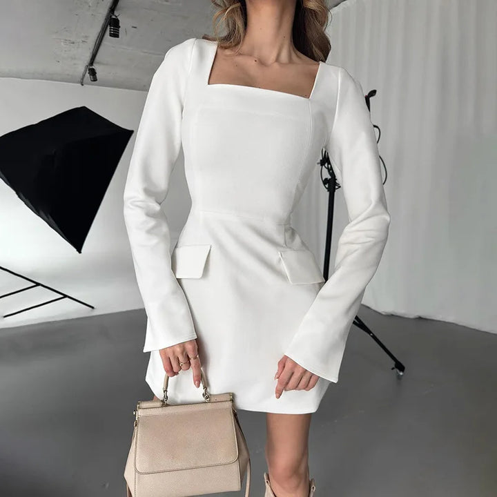 Tailored A-line mini dress with back tie waist and pocket detail - Yar