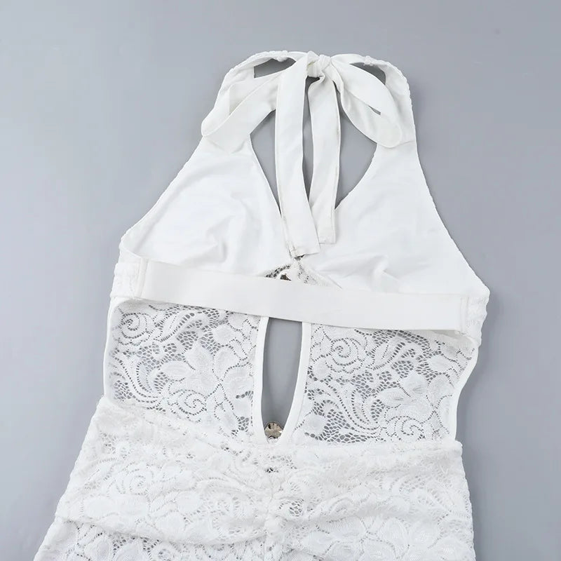 Long lace jumpsuit with open back and buckle details - Brighton