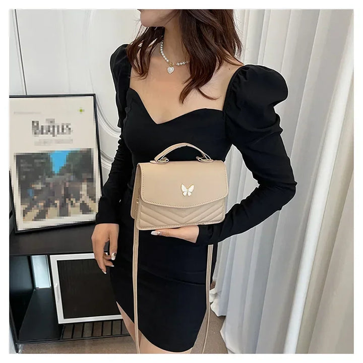 תיק דמוי עור בעיטור פרפר