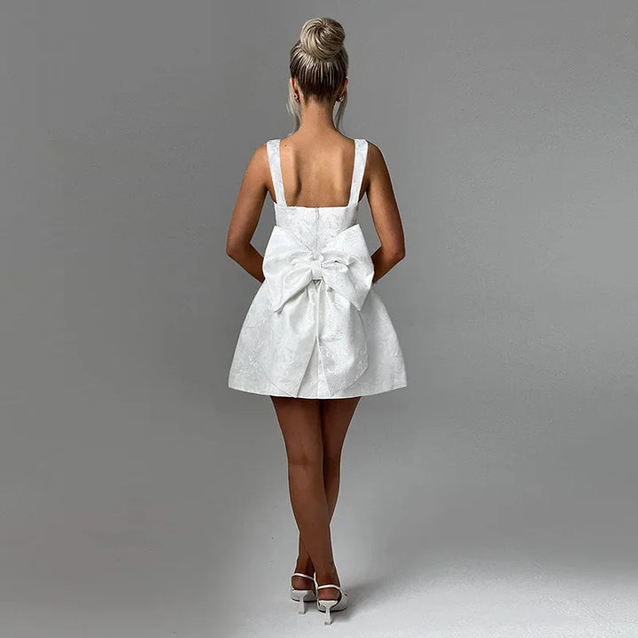 Mini dress with floral illustration print and bow detail on the back - Louisa