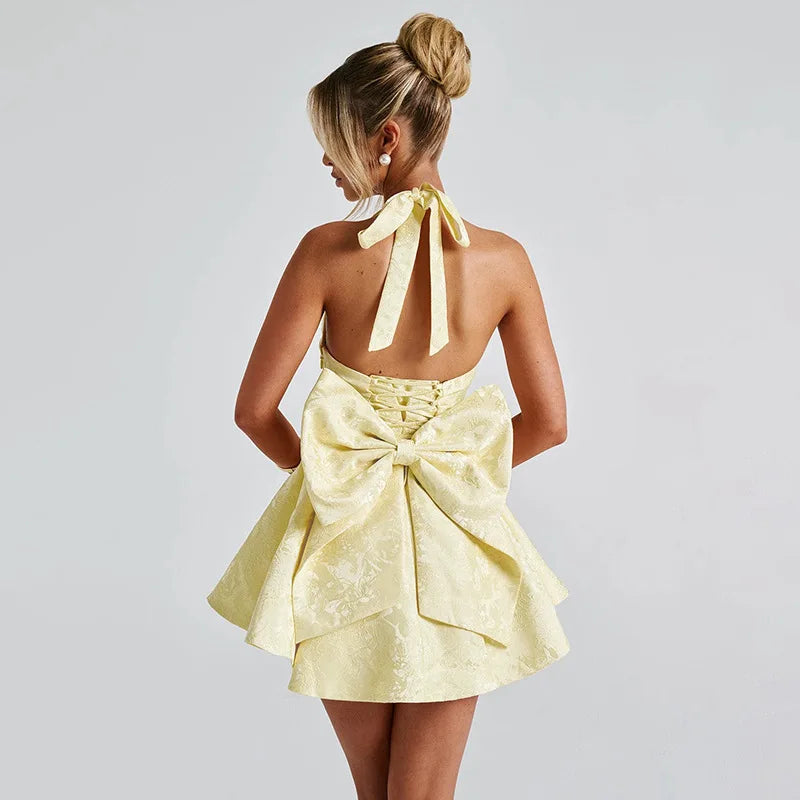A-line mini dress with floral embroidery, bow detail on the back, tie-back design for waist fit and neck tie - Pearl