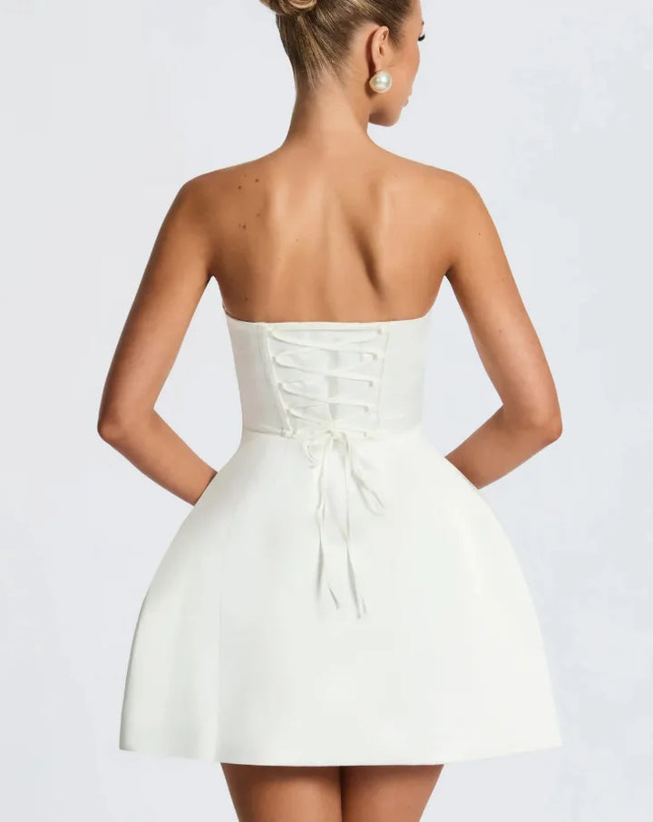 Satin mini dress in A-line cut with tie bow back detail for waist fit - Lilia